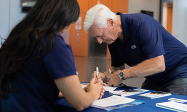 man signing up