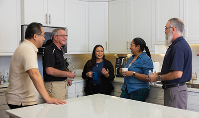 veterans in kitchen conversing